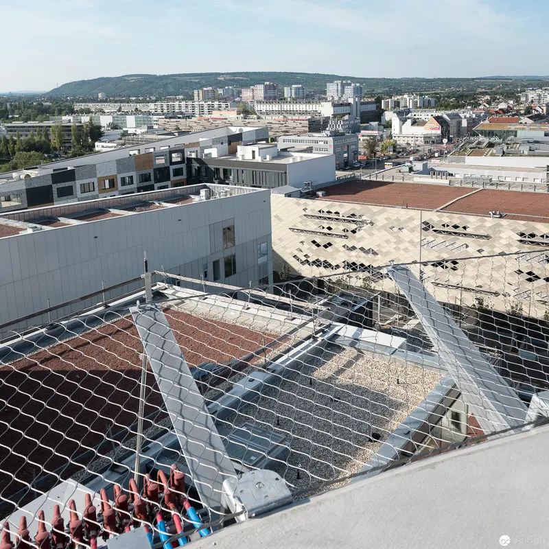 Urban Architectural Panorama with Interconnected Structural Networks and Parking Zones
