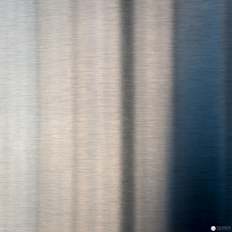 Abstract Gradient Study in Metallic Tones and Blue Shadows