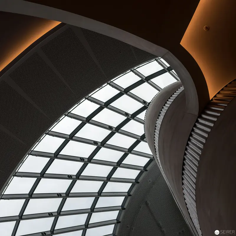 Architectural Curves: Geometric Glass and Illuminated Structural Form