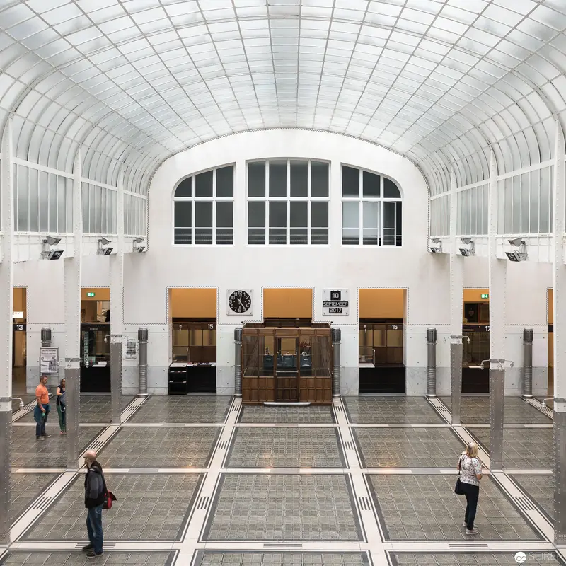 Symmetrical Interior of Historic Train Station with Architectural Glass Vaulted Ceiling