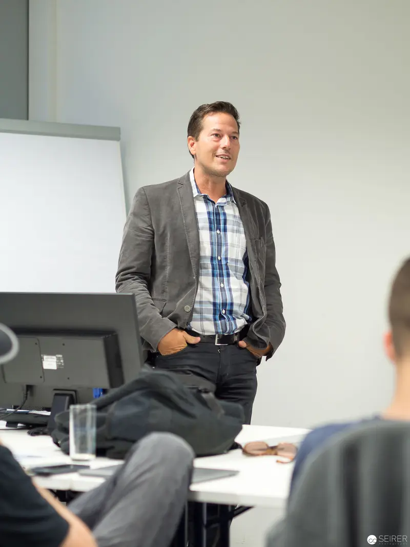 Microsoft User Group Meeting: Professional Presenter Engaging Colleagues in Conference Room