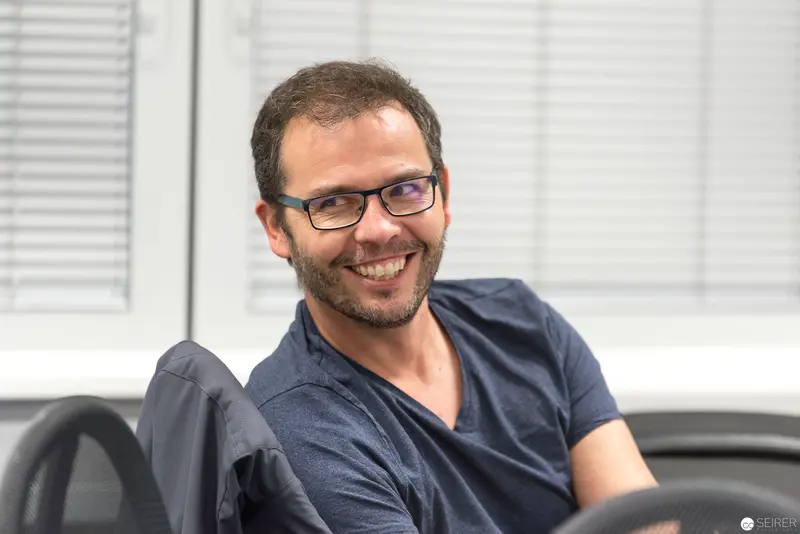 Smiling Software Professional at Microsoft User Group Meeting