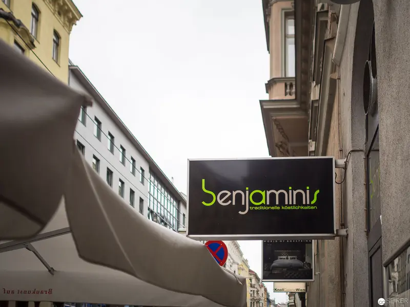 Benjaminis Restaurant Signage in Urban Viennese Street Setting