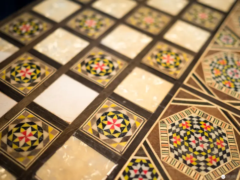 Intricate Geometric Mosaic Tiles Displaying Elaborate Symmetrical Patterns