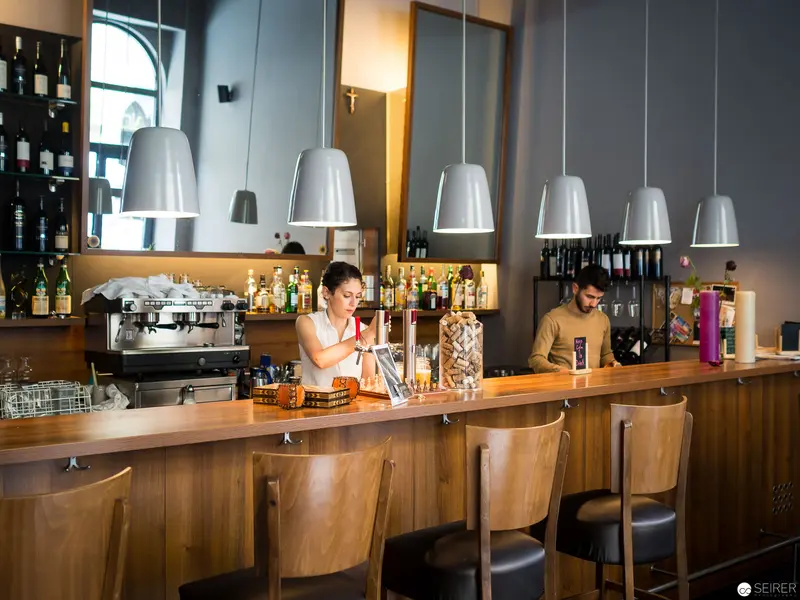 Benjaminis Vienna Bar Interior with Baristas Preparing Drinks