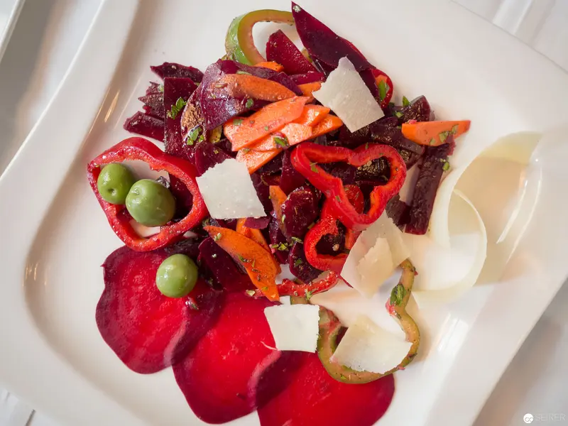 Vibrant Beetroot and Carrot Salad with Parmesan at Benjaminis Restaurant, Vienna