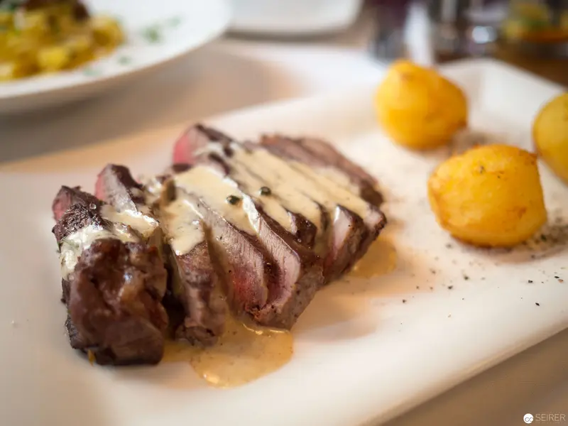 Perfectly Seared Steak with Golden Potatoes at Benjaminis Restaurant, Vienna