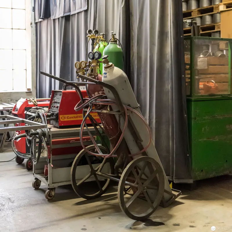 Industrial Workshop Interior with Welding Equipment at Riess Emaille Manufaktur