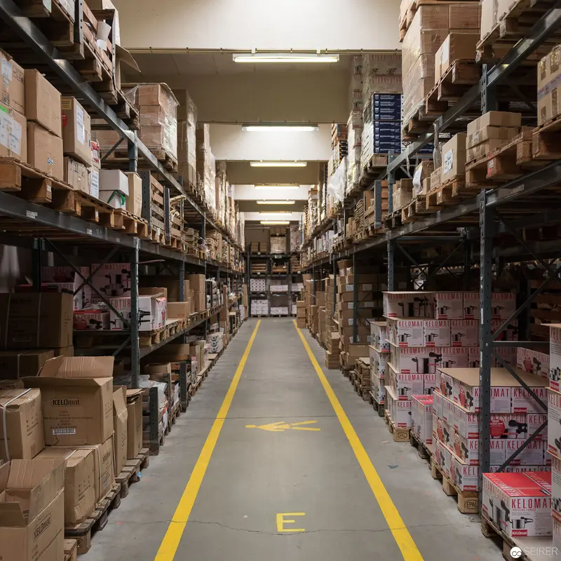 Warehouse Interior with Yellow Safety Markings at Riess Emaille Manufaktur Storage Facility