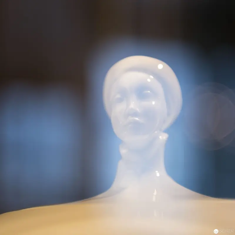 Translucent Mannequin Bust: Ethereal Luminescence in Soft Blue Tones