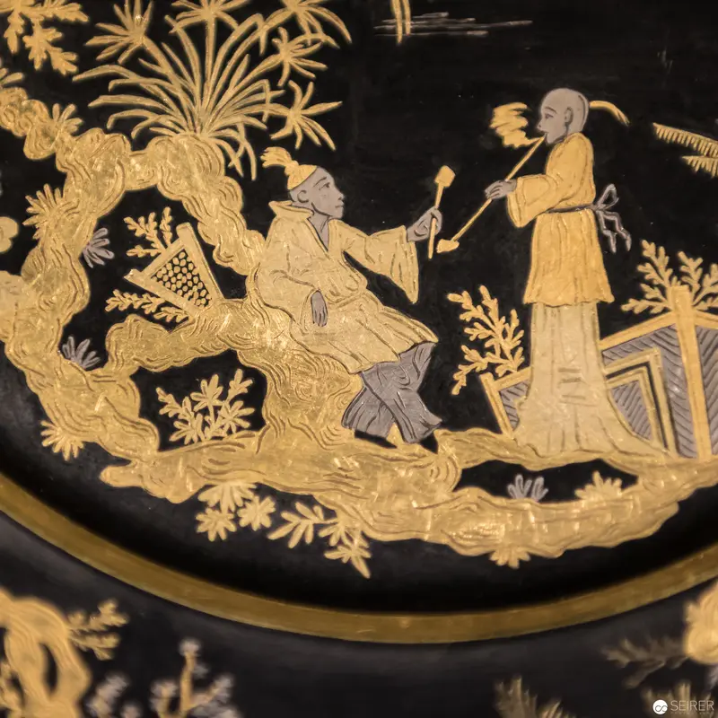 Golden-Hued Asian Decorative Panel Depicting Elegant Seated Figures in Landscape