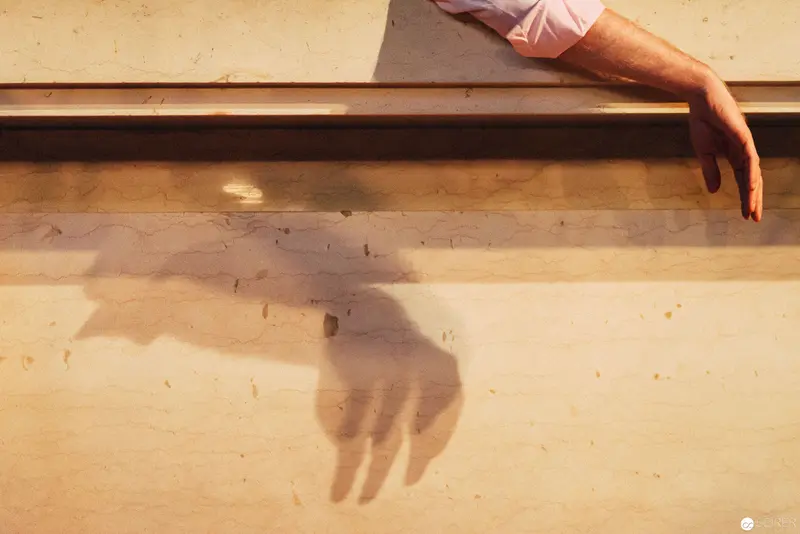 Shadow Performance of Extended Hand in Nesterval's "Dirty Faust" Theatrical Exploration