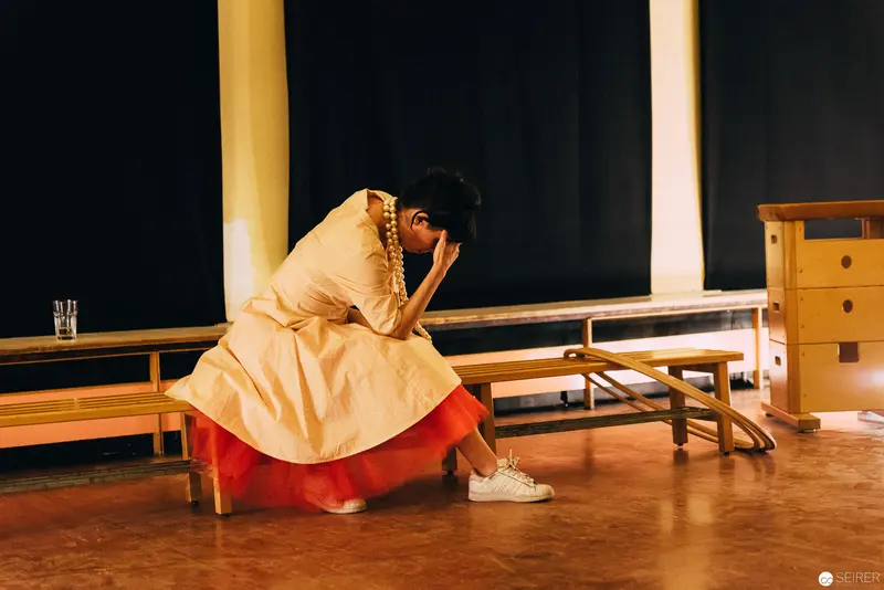 Performer in Yellow and Red During "Dirty Faust" Performance by Nesterval