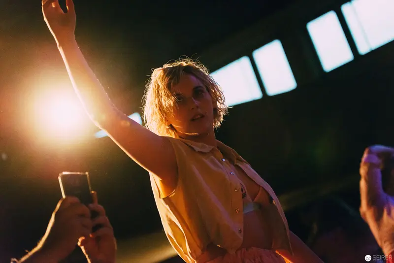 Performer Raises Arm During Immersive "Dirty Faust" Production by Nesterval