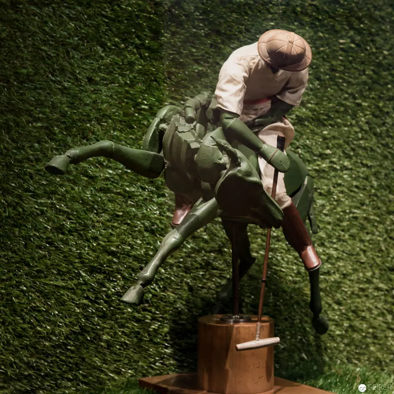 Rudolf Niedersüß Adjusting Olive-Green Mannequin in Tailoring Atelier