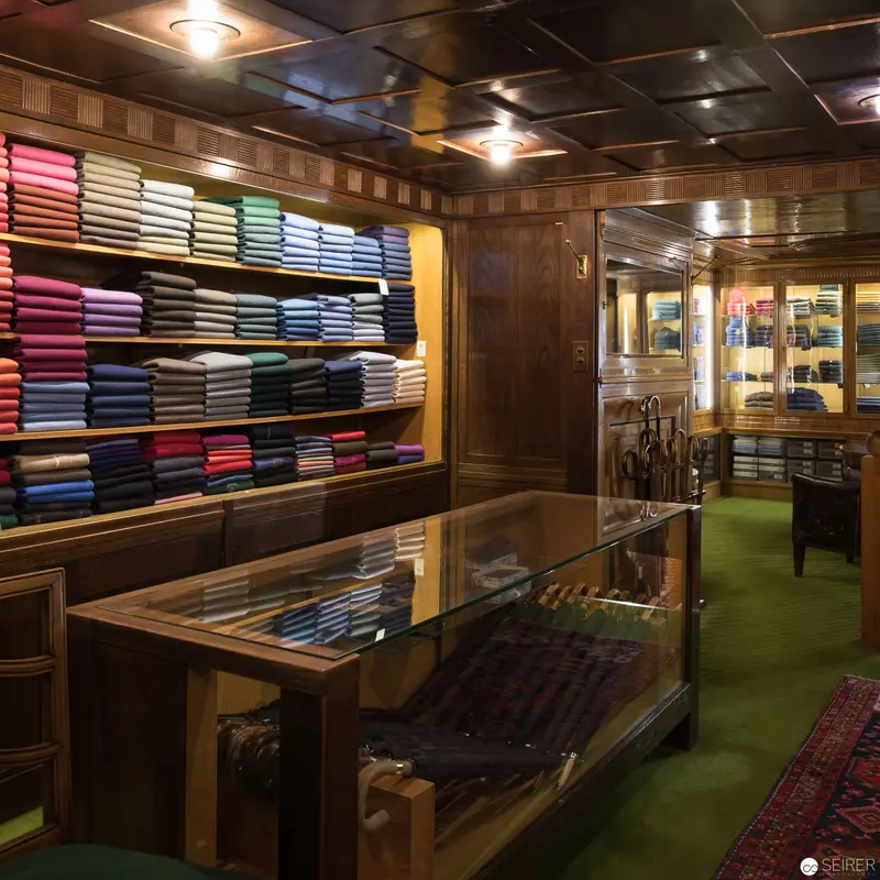Rudolf Niedersüß's Knize Mode-Atelier: Elegantly Arranged Textile Display on Graben