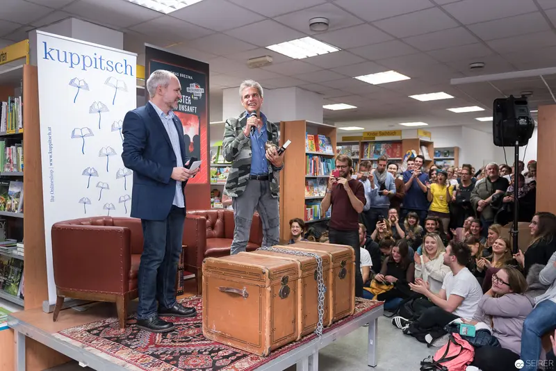Thomas Brezina Book Presentation at Kuppitsch Bookstore, Discussing "Alte Geister ruhen unsanft"