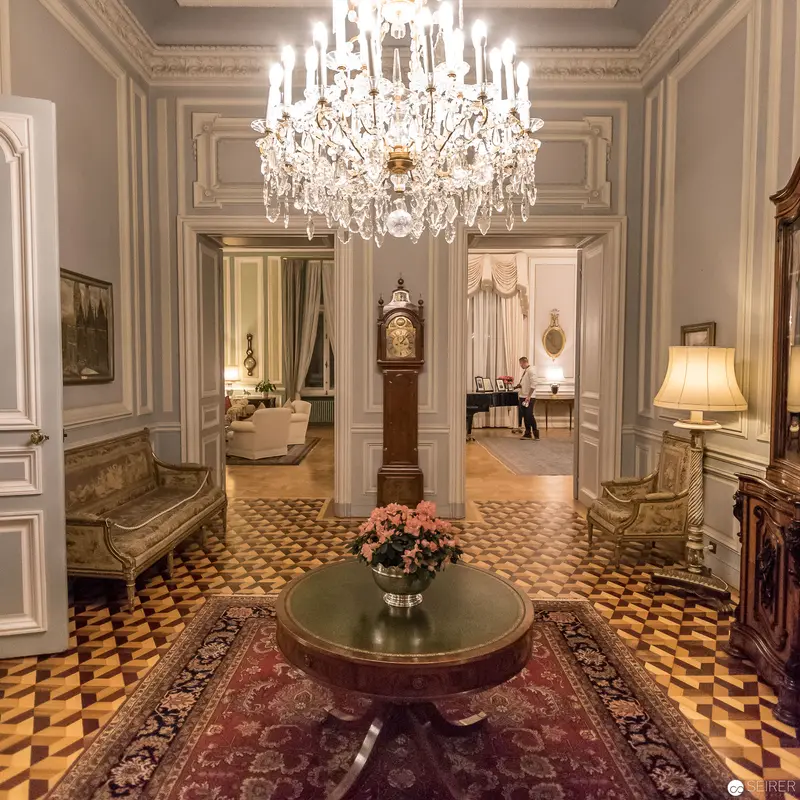 Ornate Viennese Interior with Crystal Chandelier and Antique Furnishings