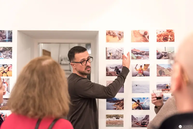 Wolf Hoffmann's Photographic Exhibition: Curator Discussing Visual Narrative