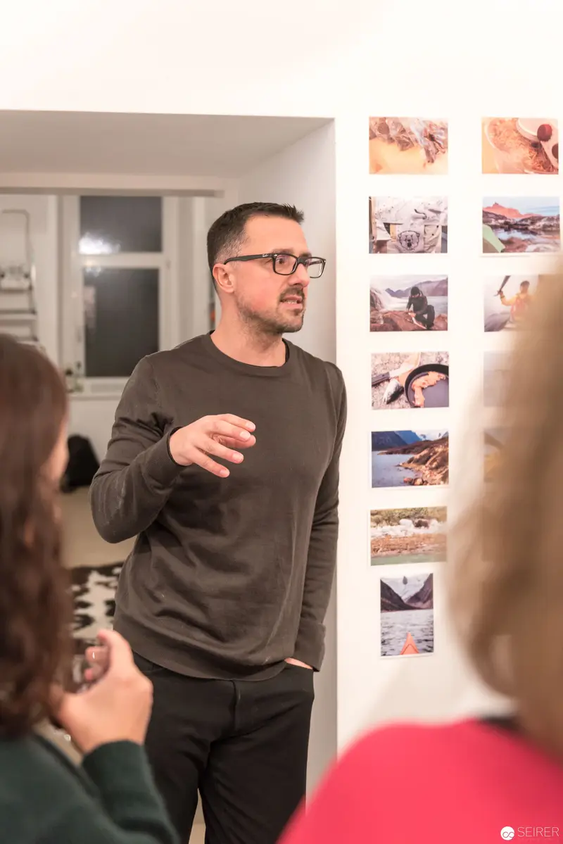 Wolf Hoffmann Presenting Photographic Series at Vernissage in Vienna
