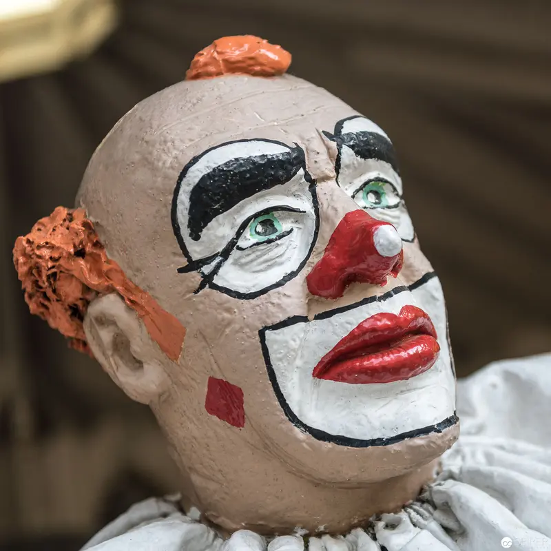 Ceramic Clown Head with Exaggerated Makeup at Böhmischer Prater, Vienna 2017