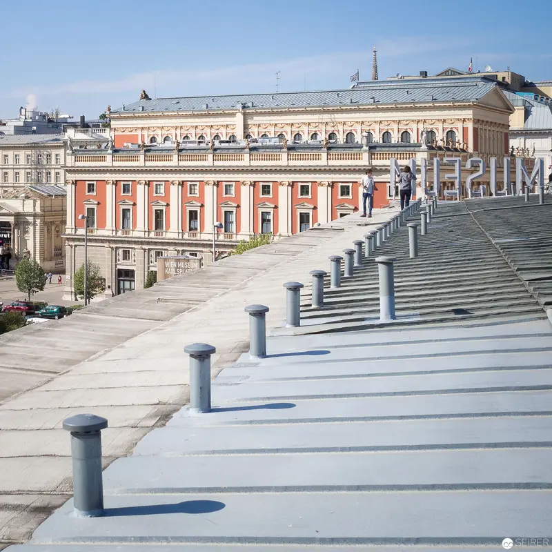 Urban Architectural Landscape with Modernist Staircase and Historic Building Facade