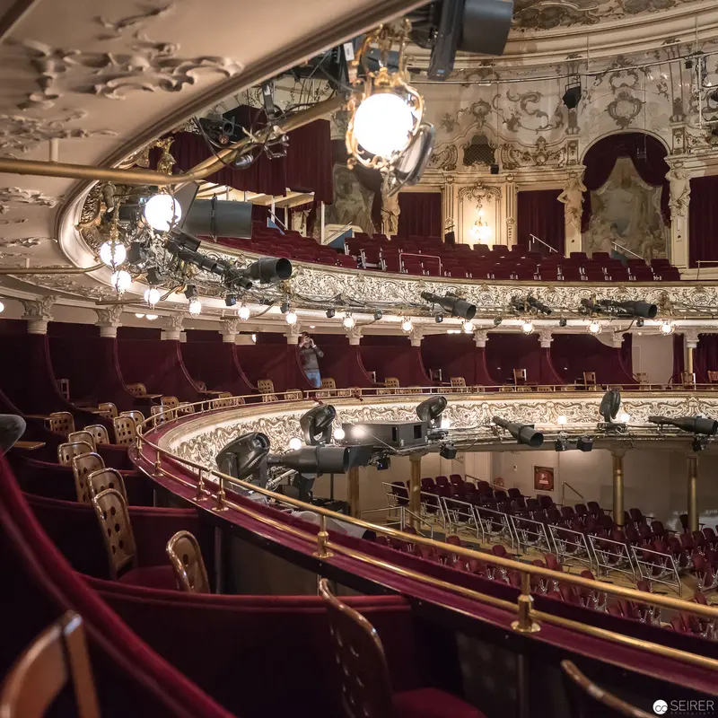 Interior View of Vienna's Ronacher Theater: Ornate Balconies and Gilded Auditorium