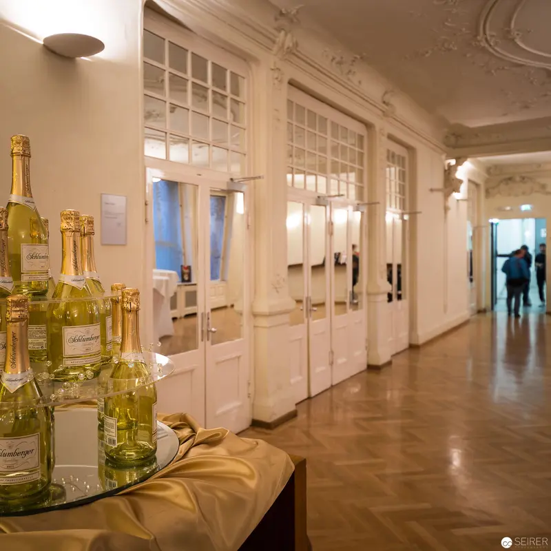 Pre-Event Wine Display in Elegant White-Windowed Foyer of Ronacher Theater