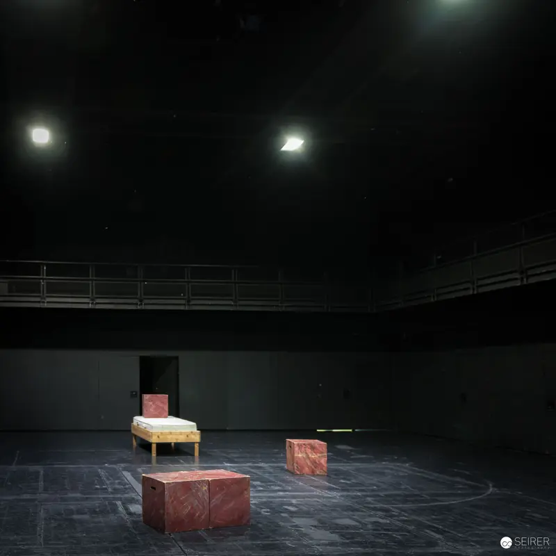 Minimalist Stage Set with Illuminated Geometric Objects at Max Reinhardt Seminar