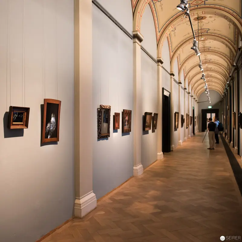 Natura Morta: Gallery Corridor with Framed Photographic Exhibition at NHM Vienna