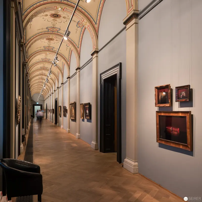 Natura Morta: Gallery Hallway with Arched Ceiling and Paintings by Oliver Mark