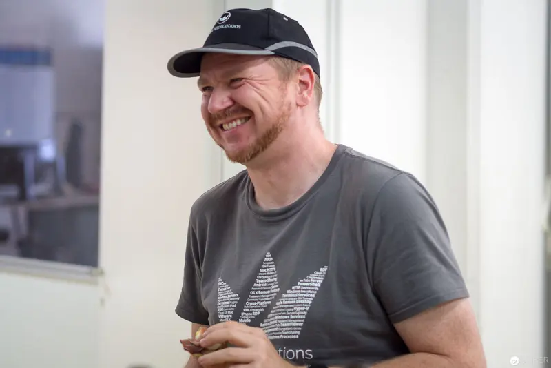 Experts Live Usergroup Member Laughing During Microsoft Technologies Discussion in Linz