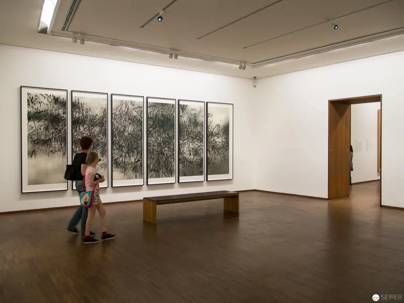 Contemplative Viewers Engaging with Monochromatic Landscape at Albertina's New Acquisitions Exhibition
