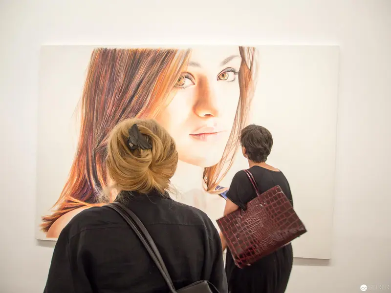 Viewer Contemplates Large Portrait in Albertina Gallery's "LOOK - New Acquisitions"