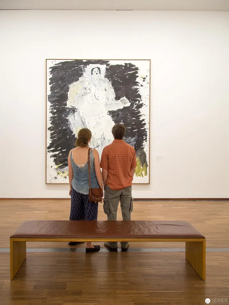Two Viewers Contemplating Abstract Artwork at Albertina Museum's New Acquisitions Exhibition