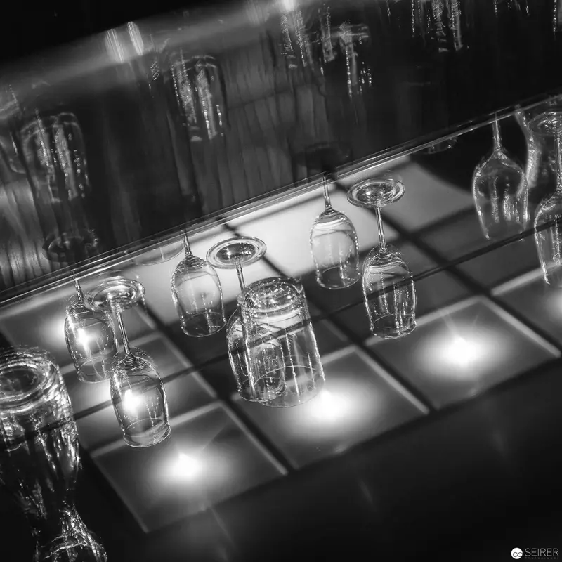 Illuminated Glassware: Monochromatic Study of Bar Stemware Arrangement