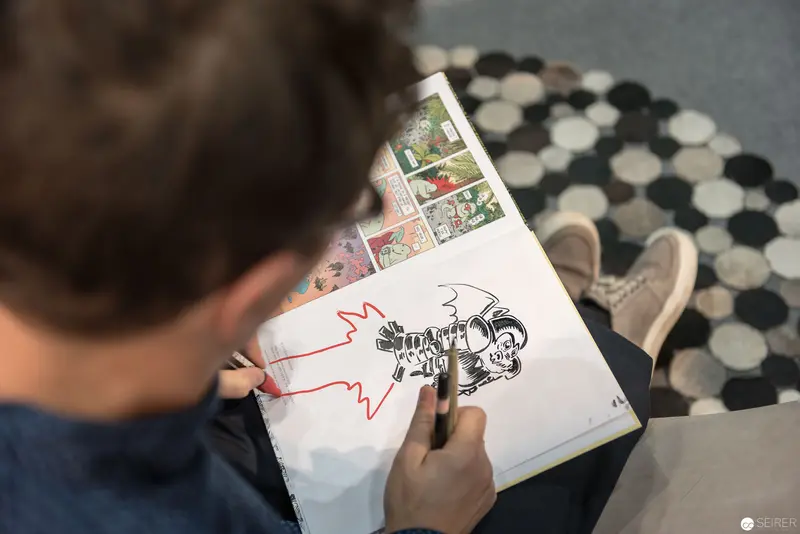Comic Book Artist Sketching Dynamic Character at Buch Wien 2017