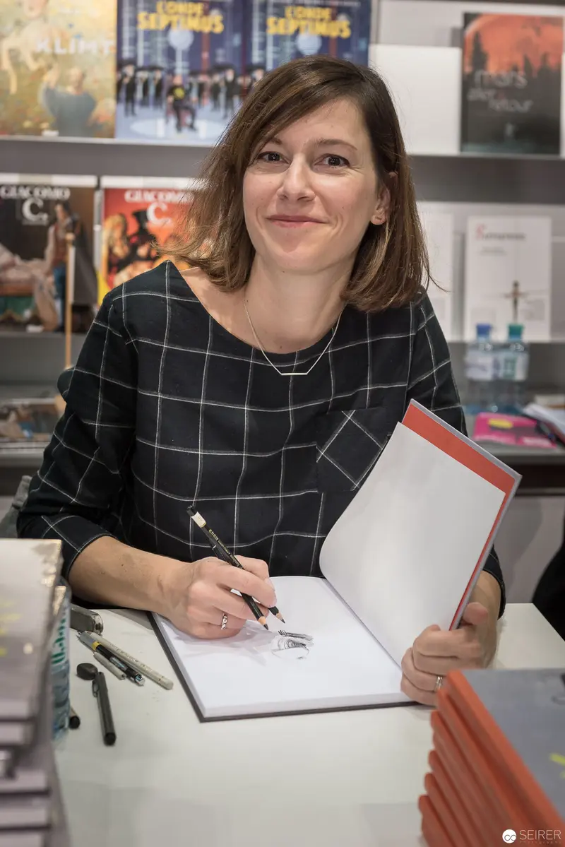 Book Wien 2017: Author at Book Fair Signing Autographs in Gridded Blouse