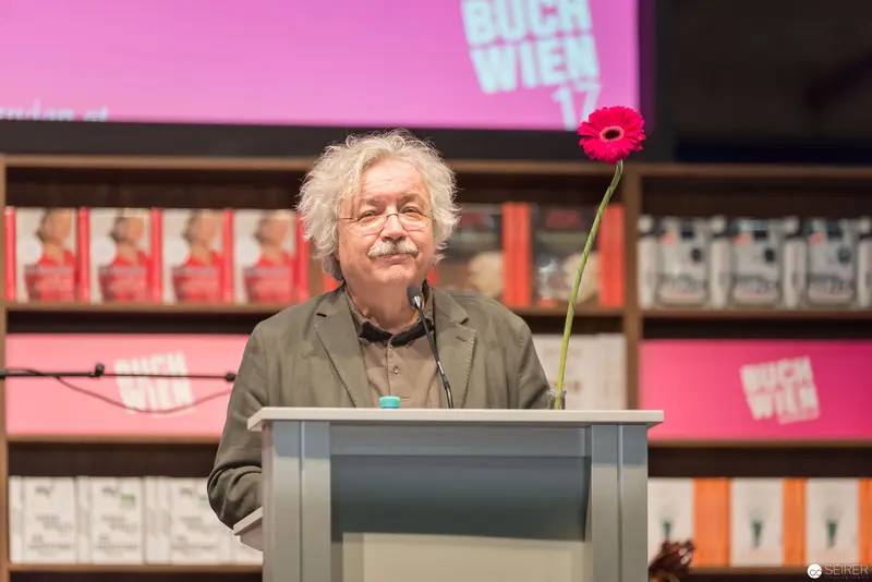 Author Speaking at Buch Wien 2017 Literary Festival with Pink Flower Podium