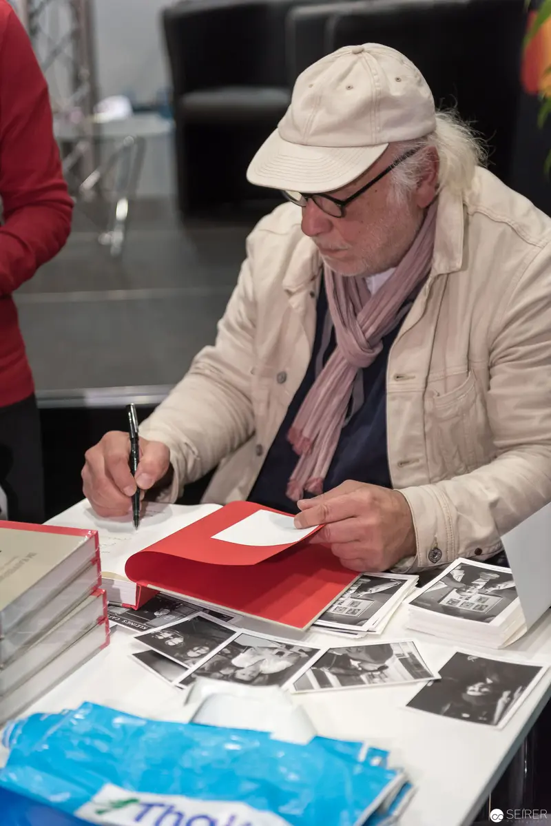 Author Signing Books at Cultural Event, Vienna Book Fair 2017