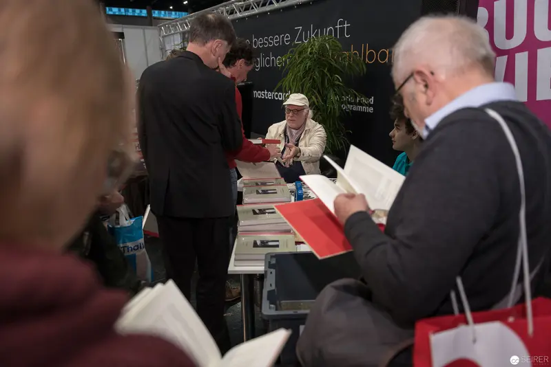 Book Fair Attendees Browsing and Engaging at Buch Wien 2017