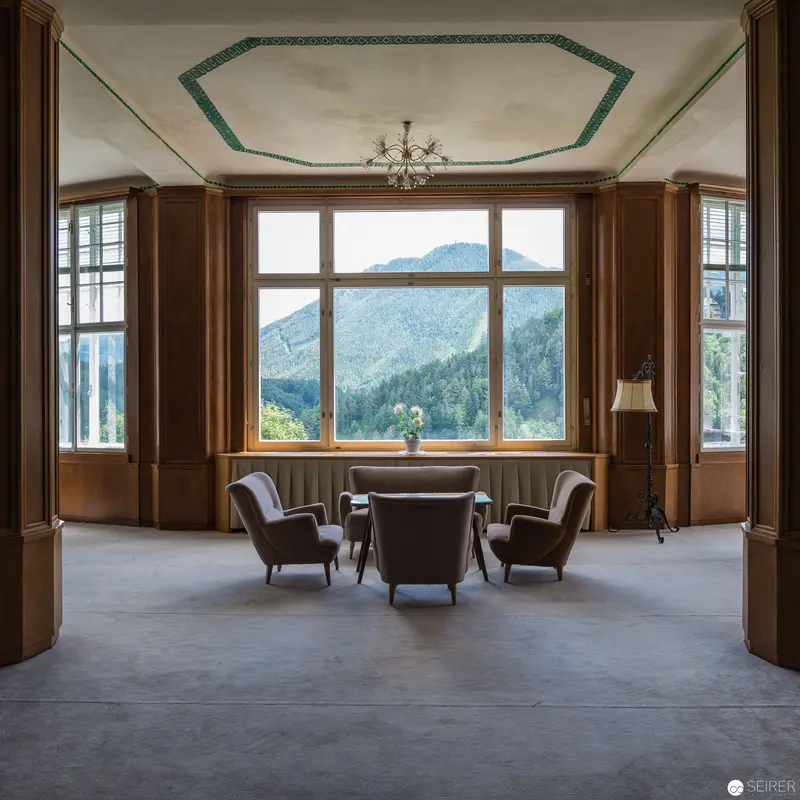 Panoramic Mountain View Through Large Windows in Elegant Empty Interior