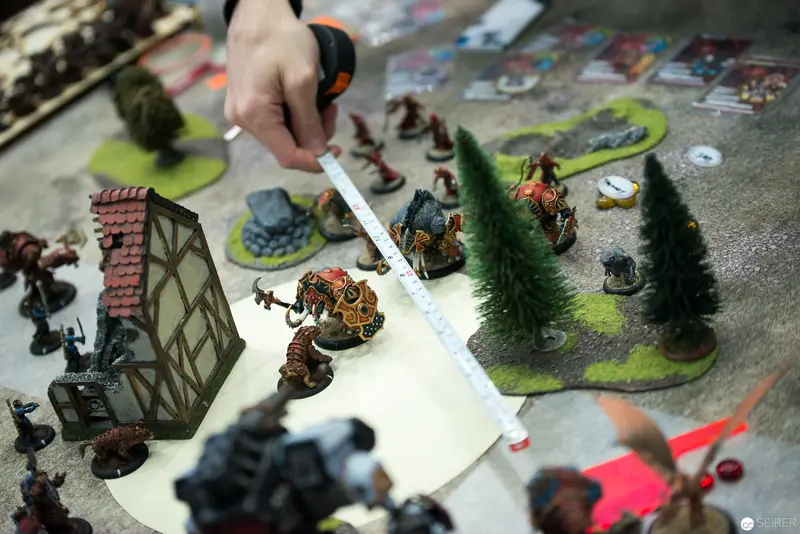 Tabletop Wargaming Miniatures on Detailed Terrain with Strategic Measurement