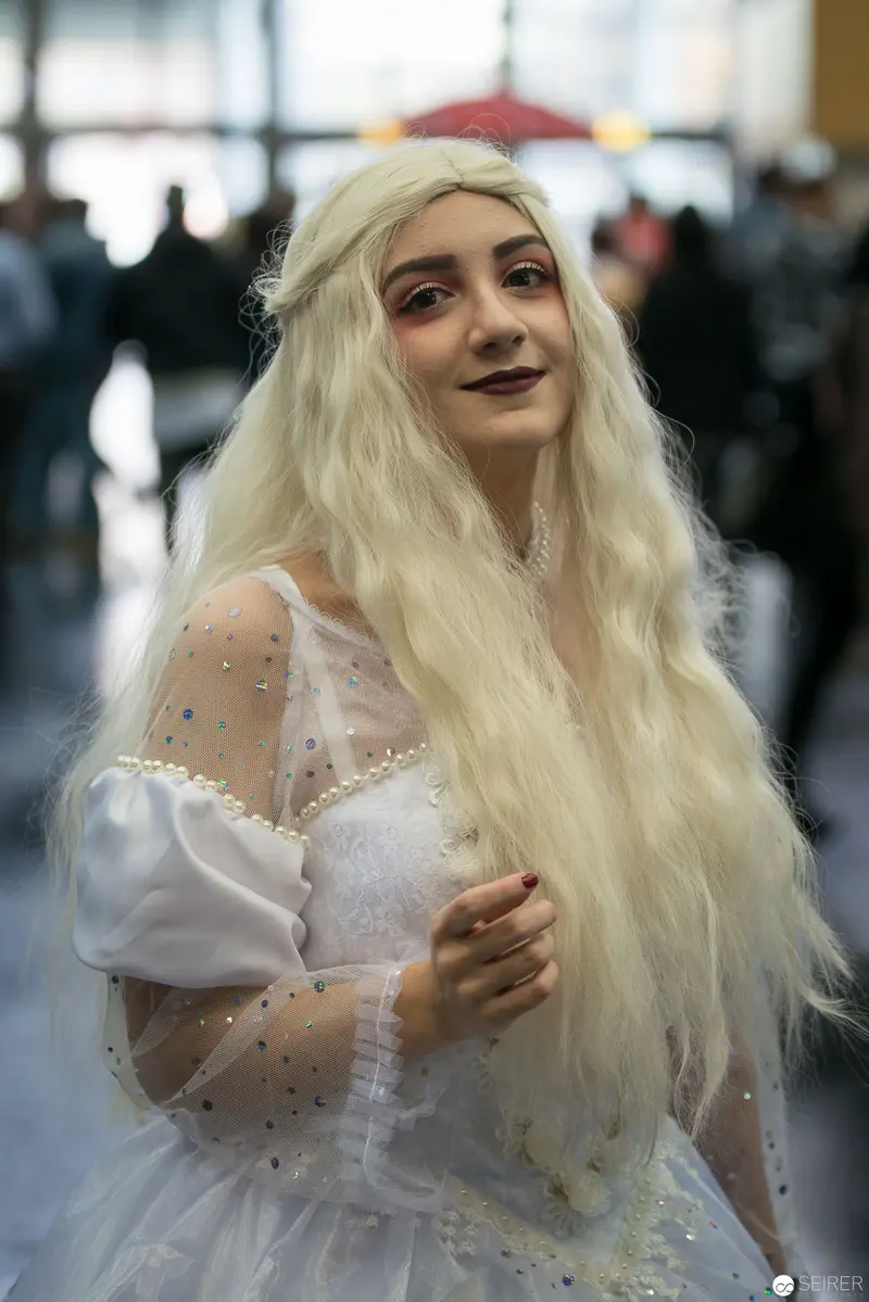 Ethereal Cosplay Portrait with Pale Blonde Wig and Luminous White Costume