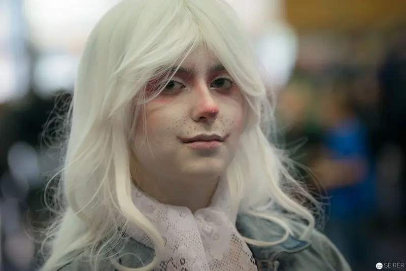 Platinum Blonde Cosplay Portrait with Ethereal Lighting and Delicate Lace