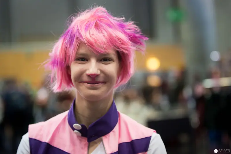 Pink-Haired Subject in Cosplay Costume at Convention or Event