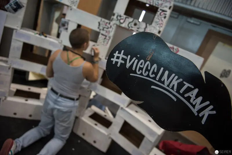 Performance Artist Creating Protest Artwork with #VicciNKTANK Hashtag Marker