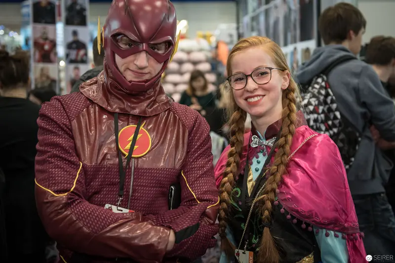 Comic Convention Cosplay: The Flash and Braided Attendee in Colorful Costumes