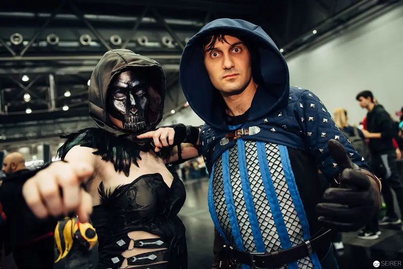 Costumed Performers in Dark Fantasy Character Portrayal at Convention