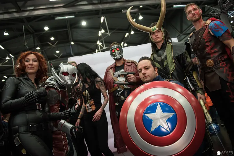 Marvel Cosplay Group Assembled with Captain America's Iconic Shield at Convention